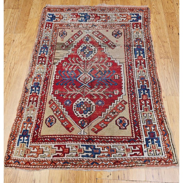 This elegant 19th Century Turkish Anatolian village rug is a beautifully preserved example of traditional village weaving...