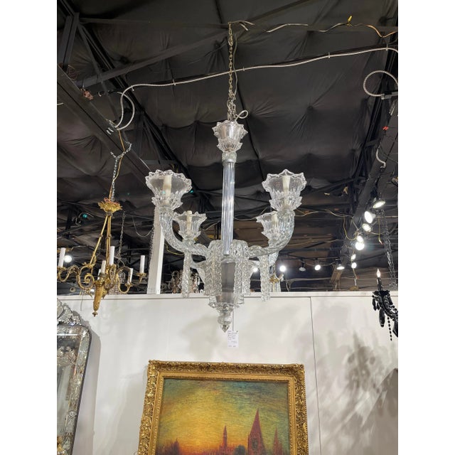 Superb French heavy cut glass chandelier with a star-point glass and chromium crown atop a swirl patterned cut glass stem....