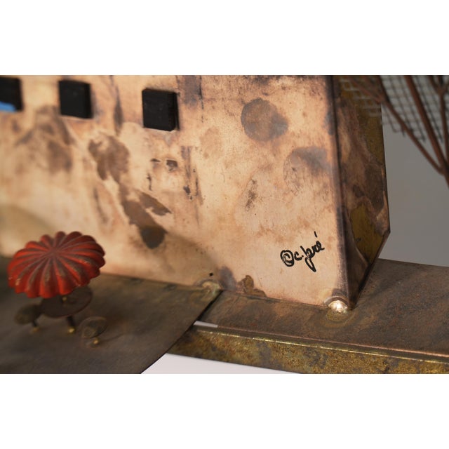 Constructed from mixed metals with painted accents, this large-scale piece showcases Jere's signature sculptural approach,...
