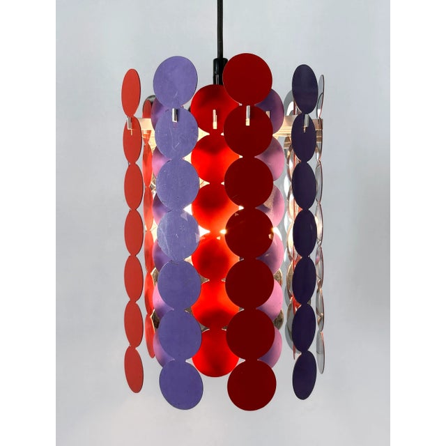 Extremely rare, lovely and highly decorative mid-century modern pendant lamp or hanging light. Manufactured by doria...