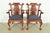 An outstanding pair of Chippendale or Georgian style armchairs or dining captain chairs In the manner of Baker Furniture...