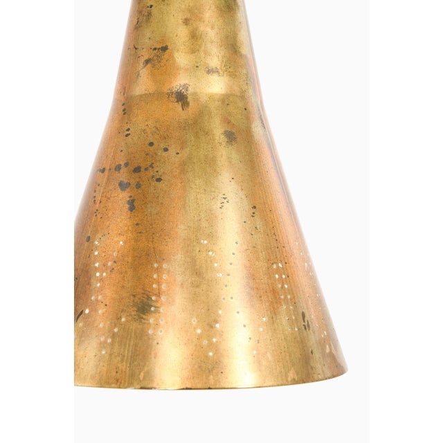 Rare ceiling lamps model 1995 designed by Paavo Tynell. Produced by Idman in Finland. Measure: Height: 28 (63) cm. This...