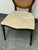 Design Plus Gallery presents a Traditional Oval Cane-Back Side Chair from The Bombay Company. The chair has a wood frame...