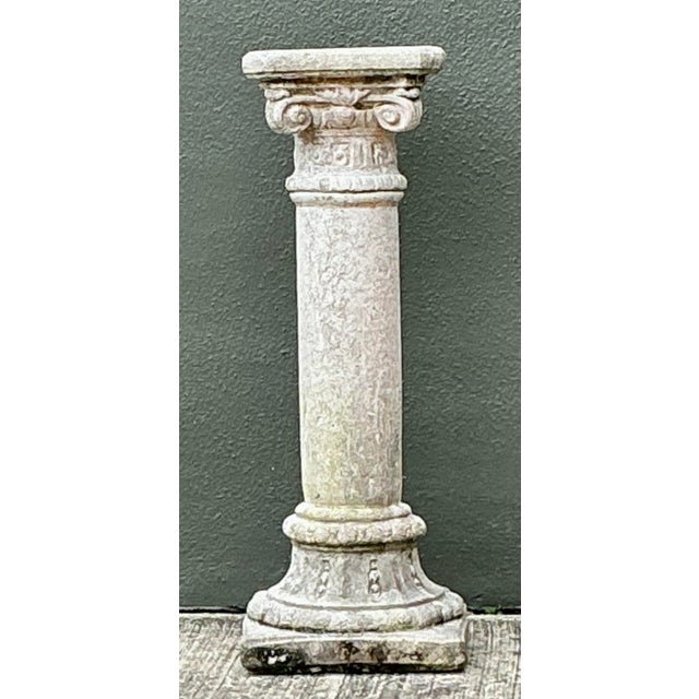 This exceptional vintage pedestal captures the timeless allure of Neo-Classical architecture, featuring a beautifully...
