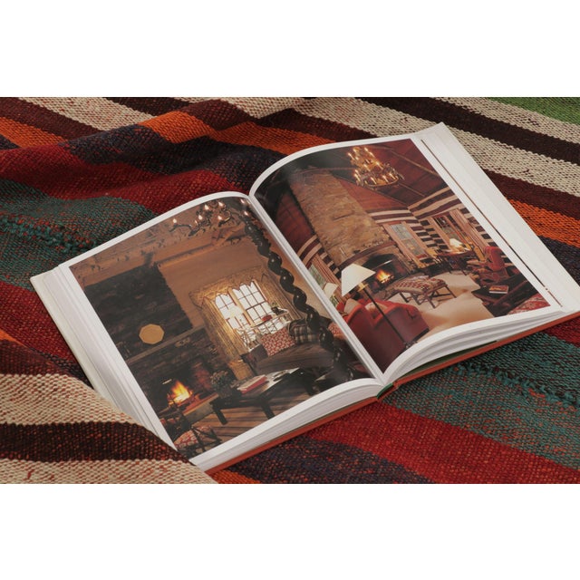 Handwoven in wool and originating circa 1950-1960, this 4x7 vintage Persian kilim rug is a tribal curation among the new...