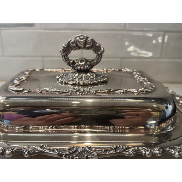 Elaborate Silverplate divided covered serving dish. Manufactured by Community (a brand of Oneida) in the Ascot pattern. An...