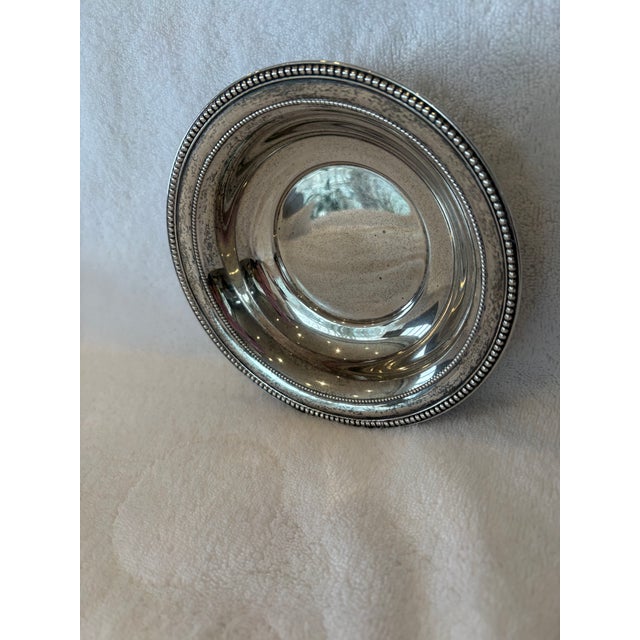 Dainty and delicate describes this small Sterling Silver bowl. Can be used as a candy dish or decorative item in your home.