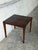 This square side table features a clean silhouette and an elegant minimalist profile. Slender tapered legs provide a...