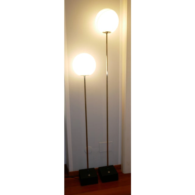 Pair of floor lamps models "Tallo 150 and Tallo 193" by Roberto Pamio for Leucos, Italy 1972 Pair of lamps with chromed...