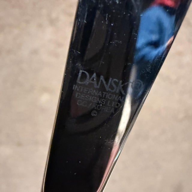 For your consideration, a pair of stainless Dansk Knives a modern flatware, stamped Dansk Korea. Dimensions: 6" L x .5" W...