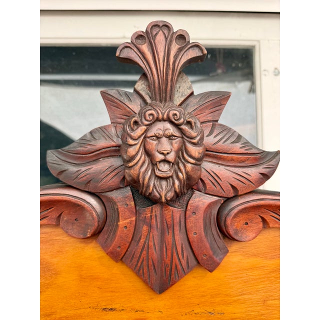 This striking antique Victorian chiffonier cabinet, dating to the late 19th century (circa 1880–1890), features richly...