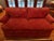 Well built luxury love seats. Covered in an animal print in a rich deep reddish mauve fabric. Very well kept with a non...