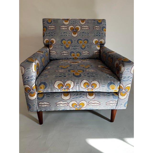 Vintage mid-century lounge chair in St. Frank fabric. Sleek lines, very firm and comfortable seating. Spring unit base...