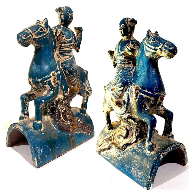 Striking bold pair of vintage glazed stoneware figurines. Based on ancient Chinese Tang Dynasty examples - each features a...