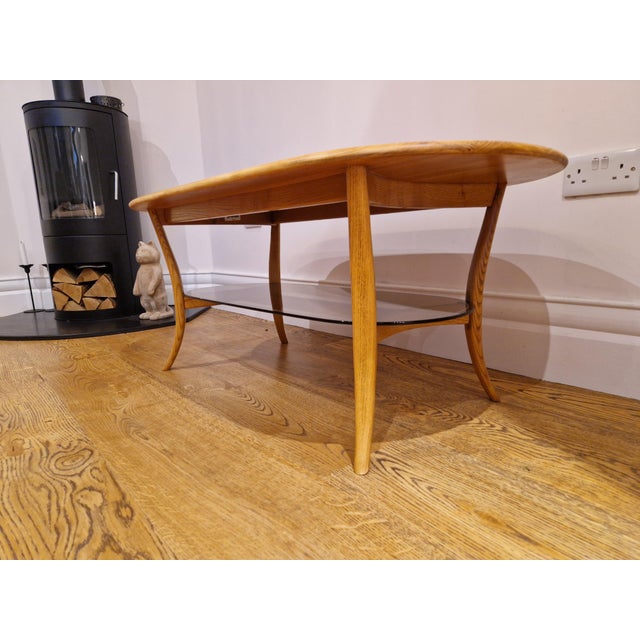 Mid-Century Blonde Oval Coffee Table Smoked Glass from Ercol, 1970s For Sale - Image 8 of 11