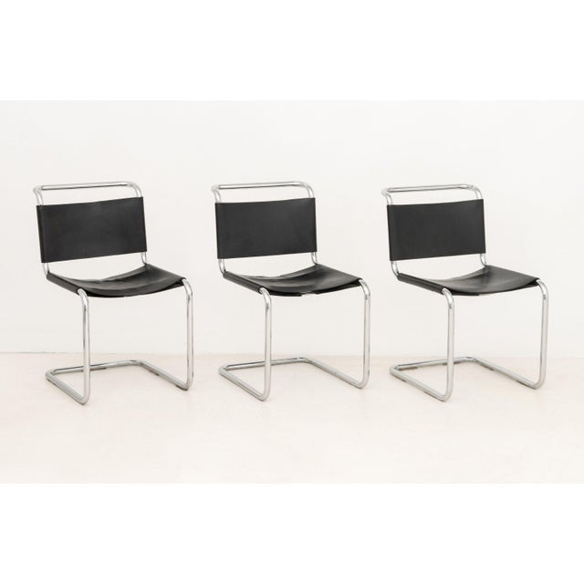 Set of Six Mies van der Rohe for Knoll MR10 Cantilevered Chairs, each with chrome-plated tubular frame and black leather...