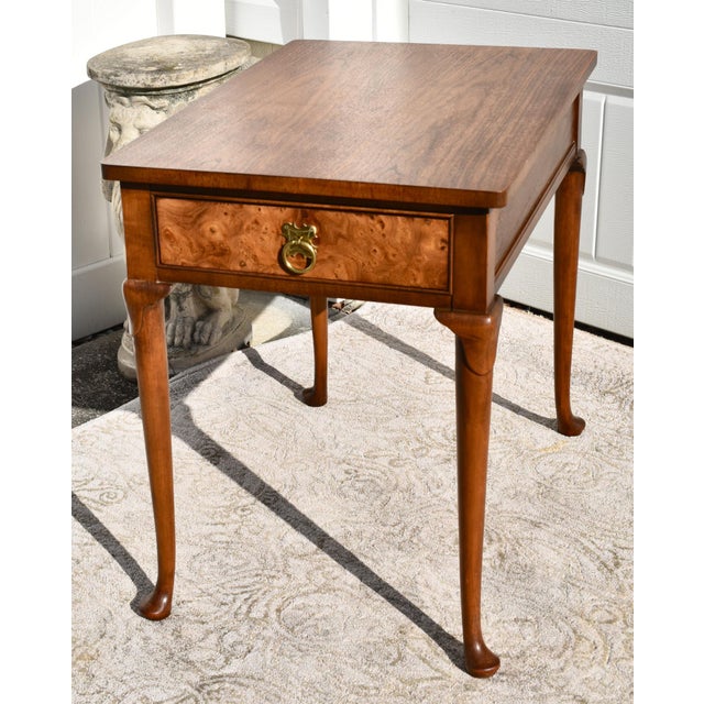 Vintage 1970's Side/End Table has a Country French Style. Made by Baker Furniture. The Wood is Pecan and Burl wood. The...