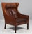 Børge Mogensen wingback chair in original patinated nature leather upholstery. Legs in teak. Model 2204, made by...