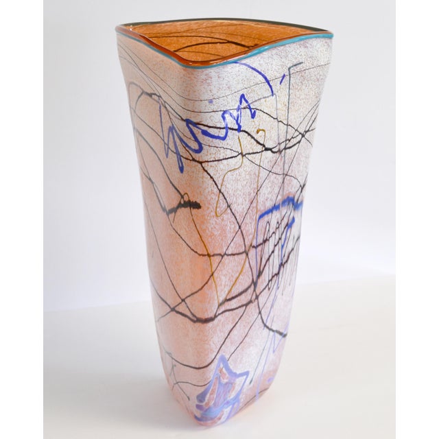 1980s Mid-century Modern large and colorful Op Art art glass vase by Taylor Backes. Features different textures and enamel...