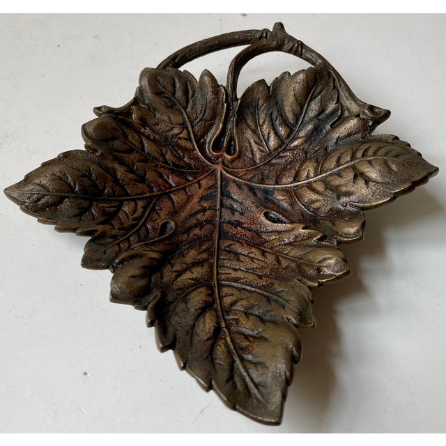 from a naturalistic French pattern from the 1910s this ornate sculptural dish or tray was made in Scandinavia during the...