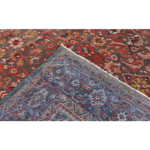 This luxurious Persian rug dating back to circa 1930 belongs to the Sultanabad type, famed for their brilliant colors and...