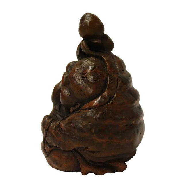 This is a collectible and decorative oriental kid figure carved from a natural bamboo plant. Dimensions: Dia 2.75"x h4"...