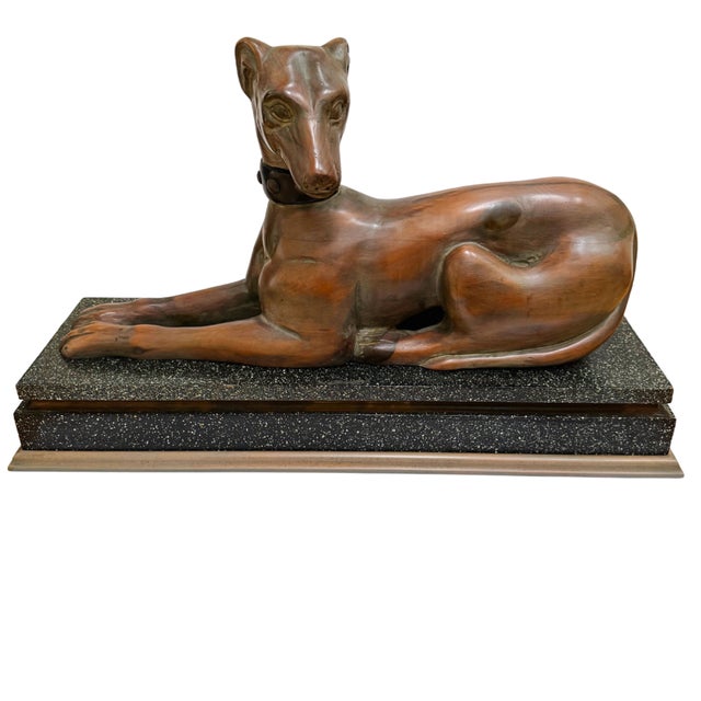 A fantastic vintage hand-carved wood Italian greyhound dog sculpture on a composite stand with a speckled finish. This is...