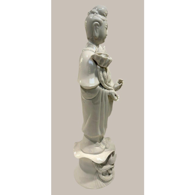 Beautiful vintage Wai Ming Hong Kong Blanc de Chine-style porcelain statue depicting Guanyin (Kwan Yin), the revered...