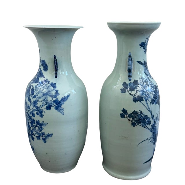 A striking assembled pair of large late-19th-century Chinese porcelain vases, each decorated in underglaze cobalt blue...