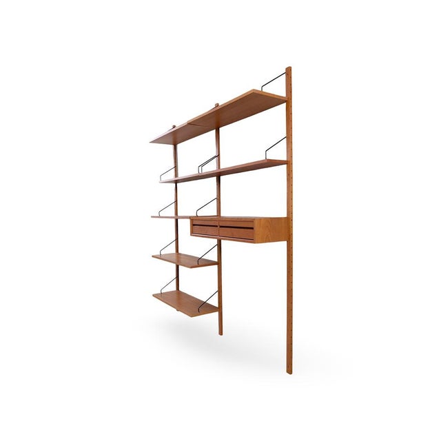 We are offering a beautiful, large wall shelf from the traditional Danish manufacturer Cado, dating from the 1960s, for...