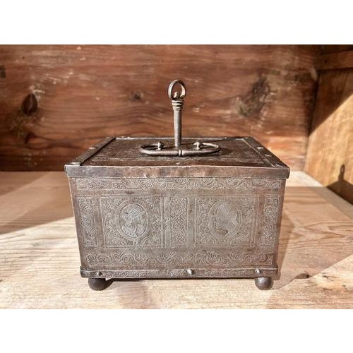 Splendid and rare table chest in steel, finely chiseled on the lid and all sides with bands of fine vegetal ramage motifs...