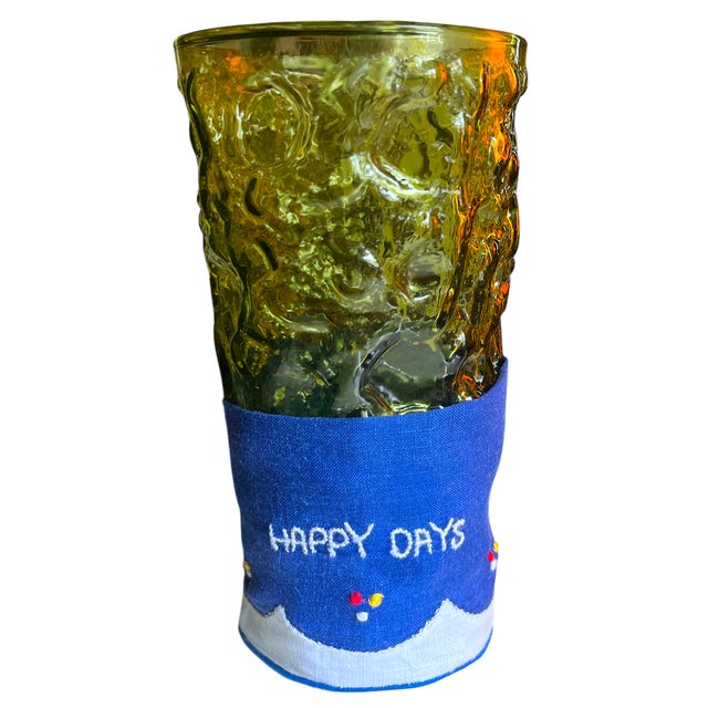 Raise a glass in style with this cheerful set of seven vintage linen cocktail napkins from the 1960s. Each napkin is hand-...