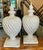 This is a large scale pair of neo-classical faux bois urns. They are a heavy casting which gives the look of a 19th...