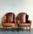 This pair of vintage Italian wingback chairs exemplifies timeless European craftsmanship, blending refined traditional...