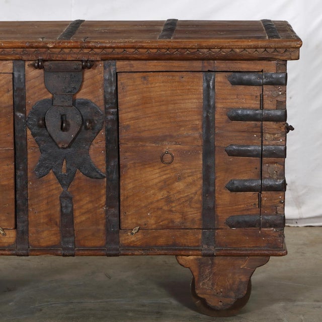This antique Indian pitara chest, traditionally used to store household textiles, has been thoughtfully reduced in depth...