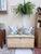 This early pine blanket chest features its original grain‑painted finish, a beautifully worn surface that has mellowed...