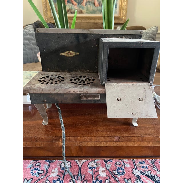 Brand Empire Metalware by Empco of Two Rivers, Wisconsin. late 1920.s, child's toy oven voltage 110, heavy stamped steel,...