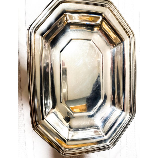 Art Deco Octagonal Silver Plated Handled Serving Dish Description This striking Art Deco serving dish features a...