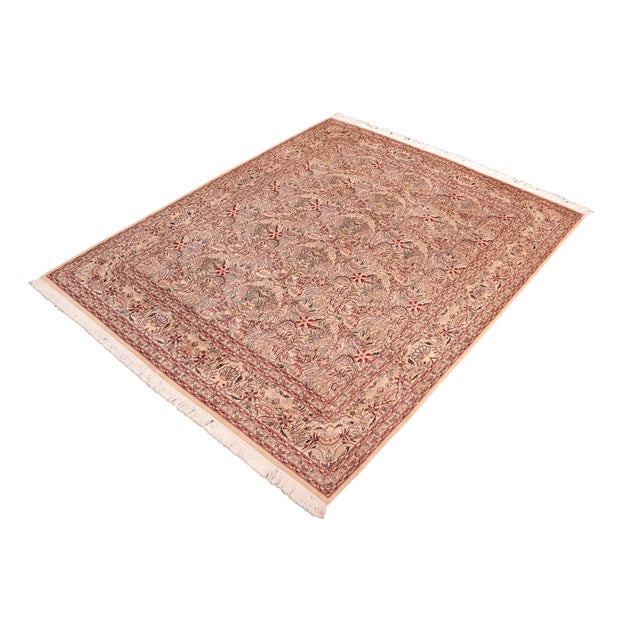 Designed with mesmerizing intricacy and gorgeous color palette, this hand-knotted masterpiece demonstrates the beauty and...