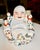Chinese Qing Dynasty Famille Rose porcelain sculpture of the Hotei Laughing Buddha (Budai) with hand-painted multicolored...