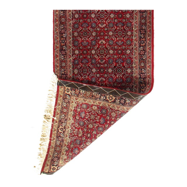 This is a hand-knotted Bidjar design rug. The piece is made of Lamb's wool from India. This rug has a dense, soft pile,...