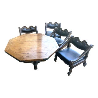 Solid Oak Spanish Colonial Revival Octagonal Game Table and Four Chairs on Brass Casters - Vintage Late 20th Century For Sale