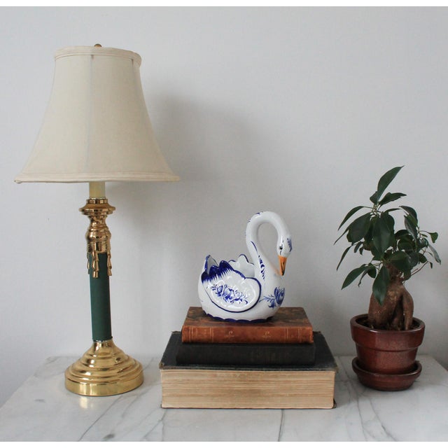 Vintage hand painted blue and white ceramic swan planter. Made in Portugal. Makers mark on the bottom. Two very small...