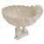 A beautiful mid-century Italian whiteware centerpiece bowl featuring a scalloped clam shell bowl anchored by three...