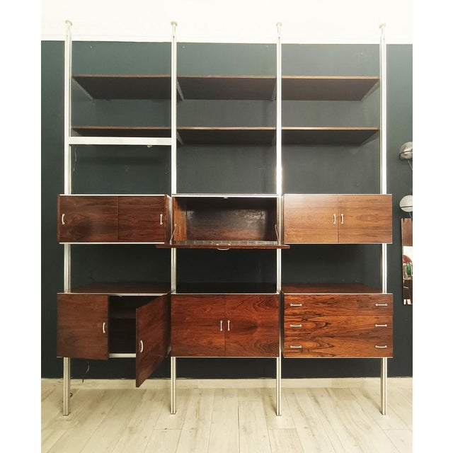 CSS modular bookcase designed by George Nelson for Herman Miller. The system is an iconic modular shelving unit that...