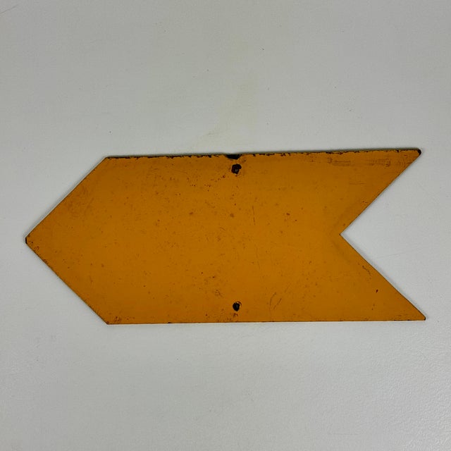 A beautiful vintage modern large arrow in deep yellow. A great design decor element. Circa: Mid-Late 20th Century...