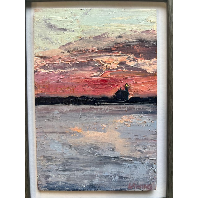 It was one of those rosy sunsets, a deep pink lighting up the sky and silhouetting the North Light on the tip of Block...