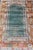 Measures: 3'2 x 5'4. Antique Angora Oushak rug with solid background in teal, blue, orange colors and accent colors of red...