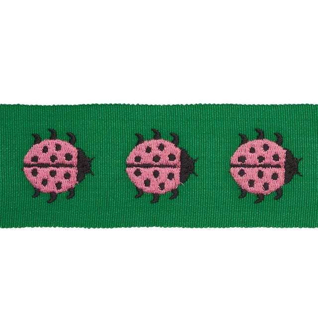 Embroidered ladybugs march along a woven cotton tape for a sunny and happy accessory that’s the height of preppy chic....