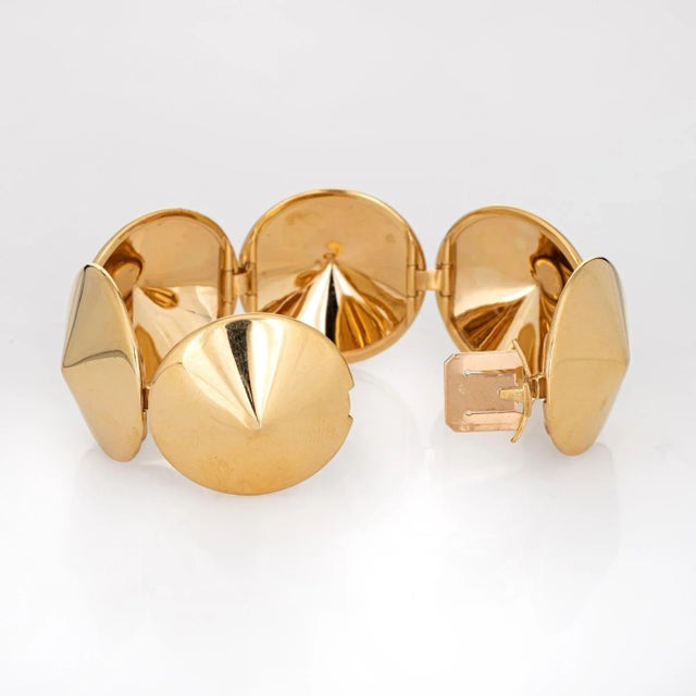 Stylish estate Van Cleef & Arpels "Chapeau Chinois" bracelet crafted in 18 karat yellow gold (circa early 2000s). Timeless...